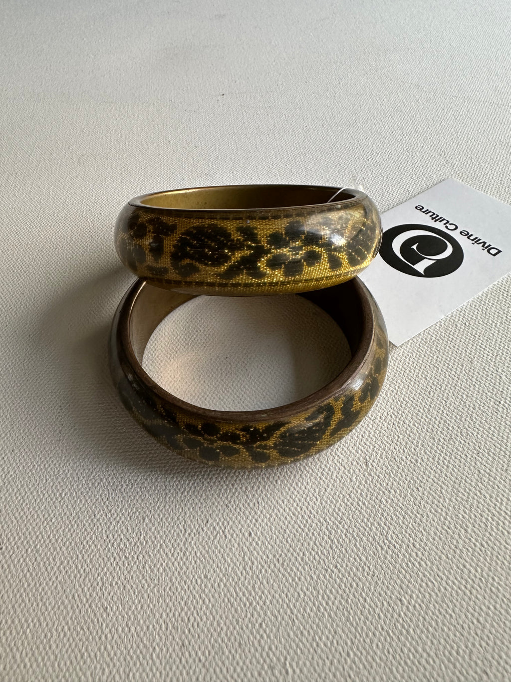 GOLD AND BLACK FLORAL BANGLES